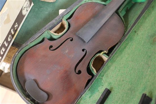 A violin bearing label Ruggeri with two bows and another